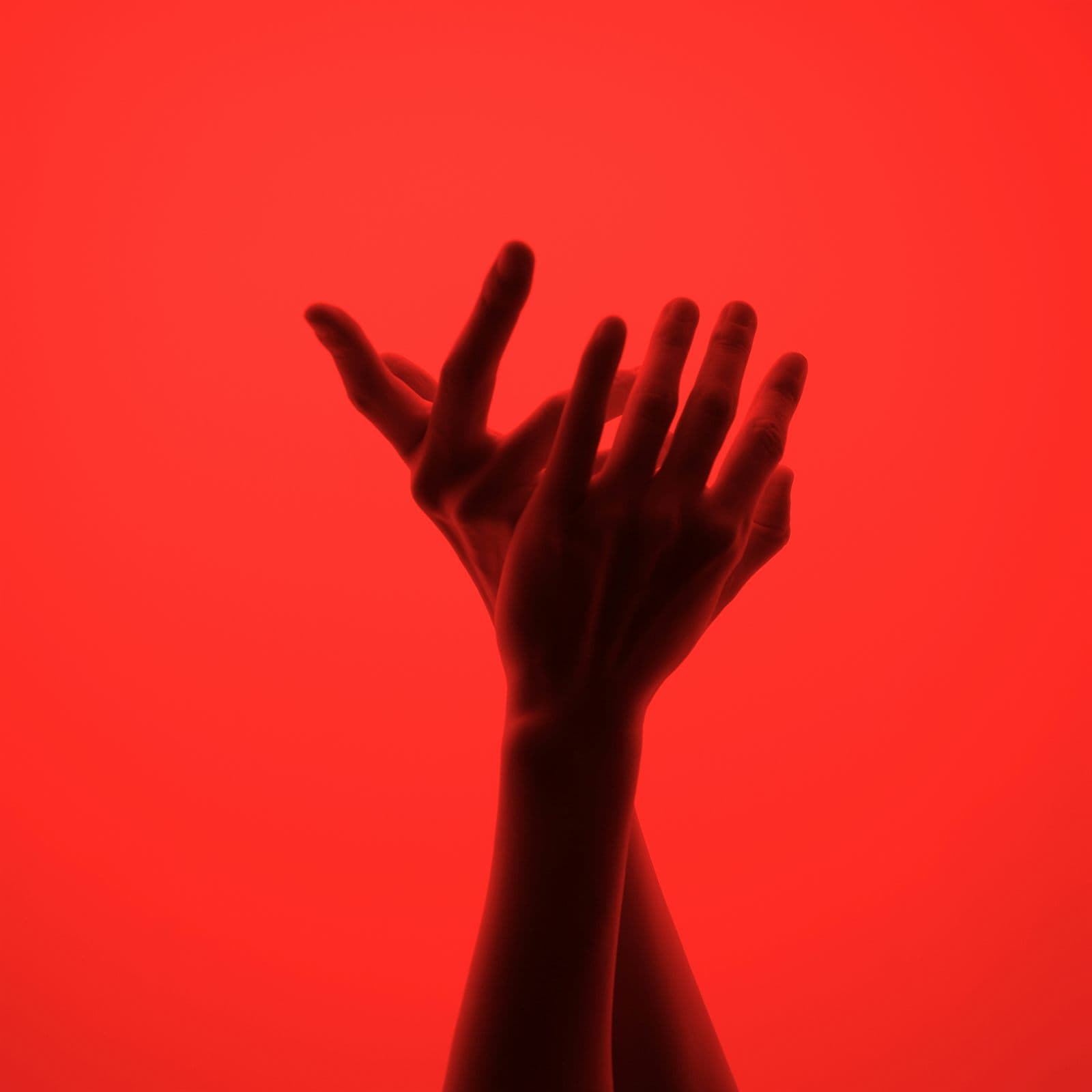 Red hands visual for unfiltered AI models content portfolio
