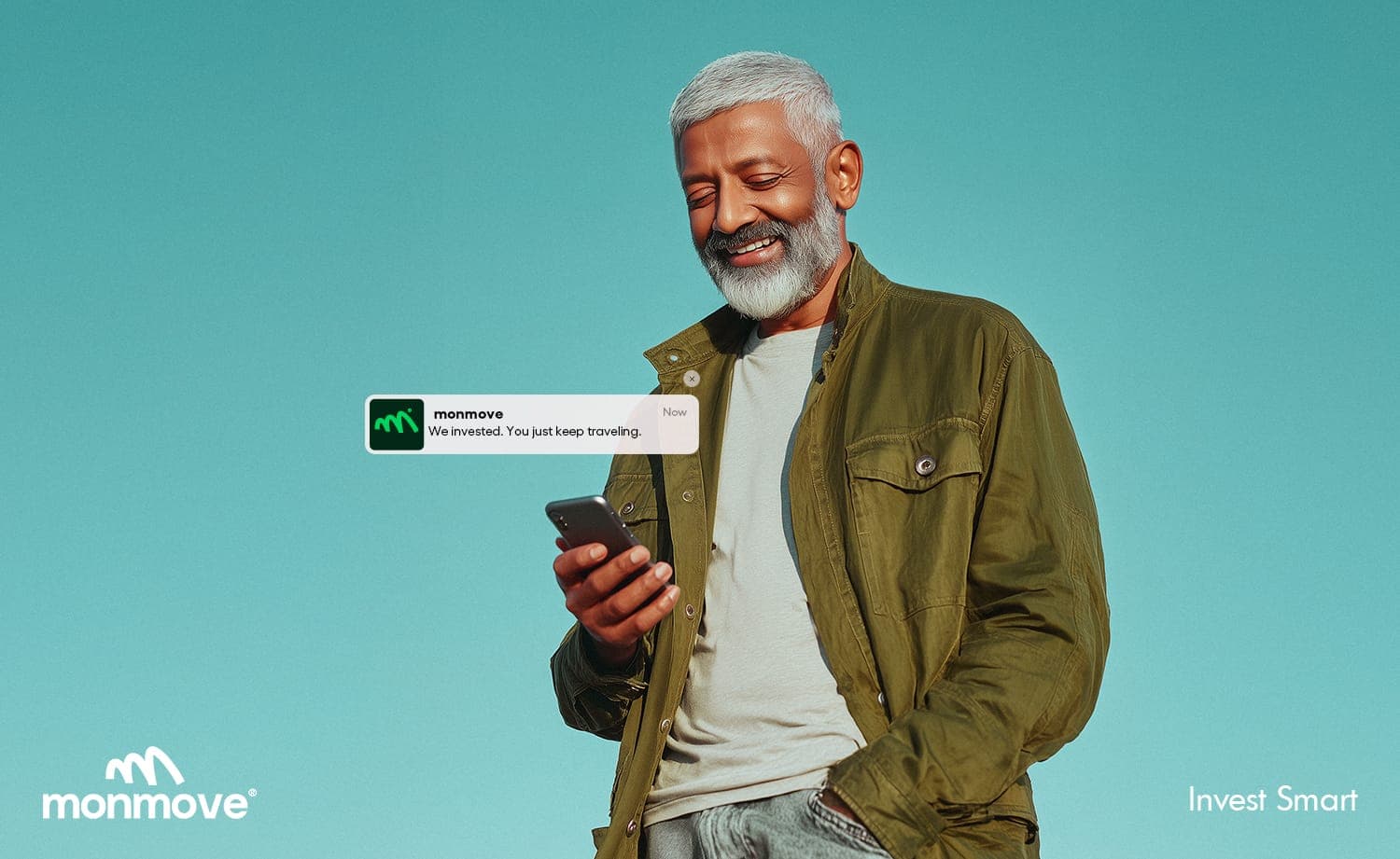 Monmove travel investment advertisement with a man checking his phone