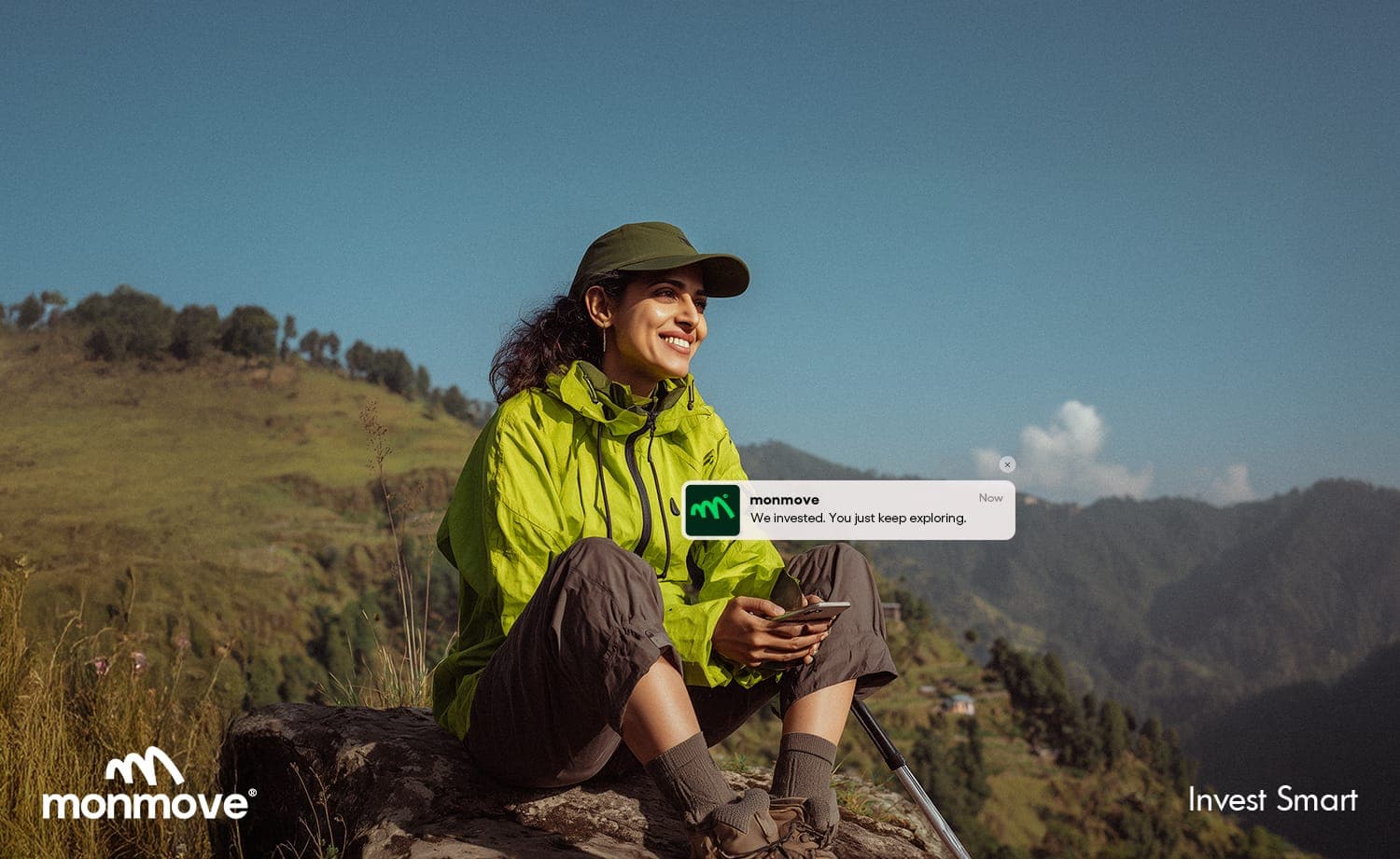 Monmove outdoor lifestyle advertisement with a hiker and phone notification