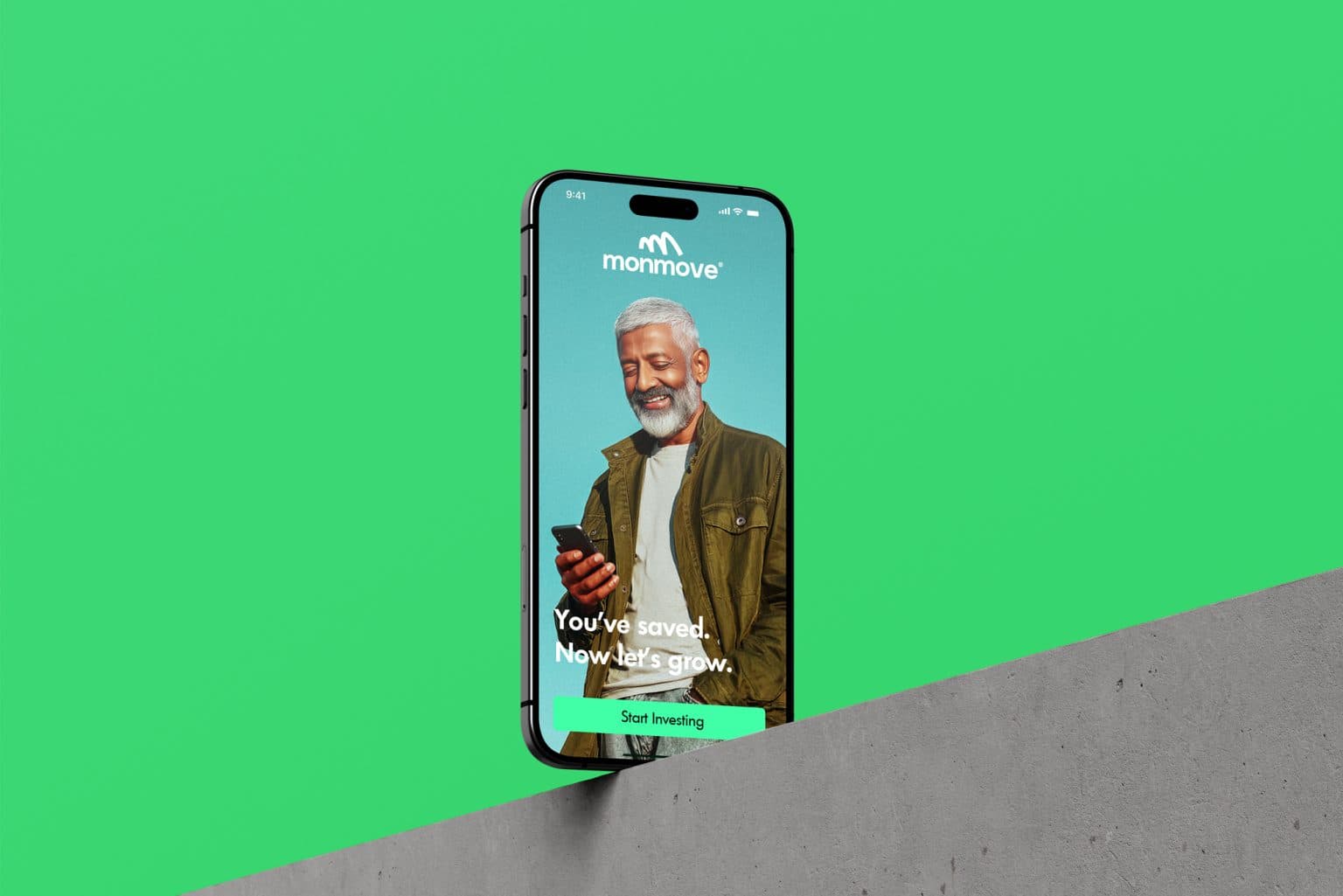 Monmove app landing mockup on a green background with phone and concrete surface