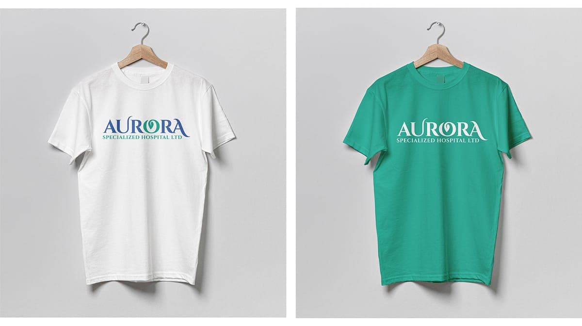 Aurora hospital logo applied to white and green t-shirts